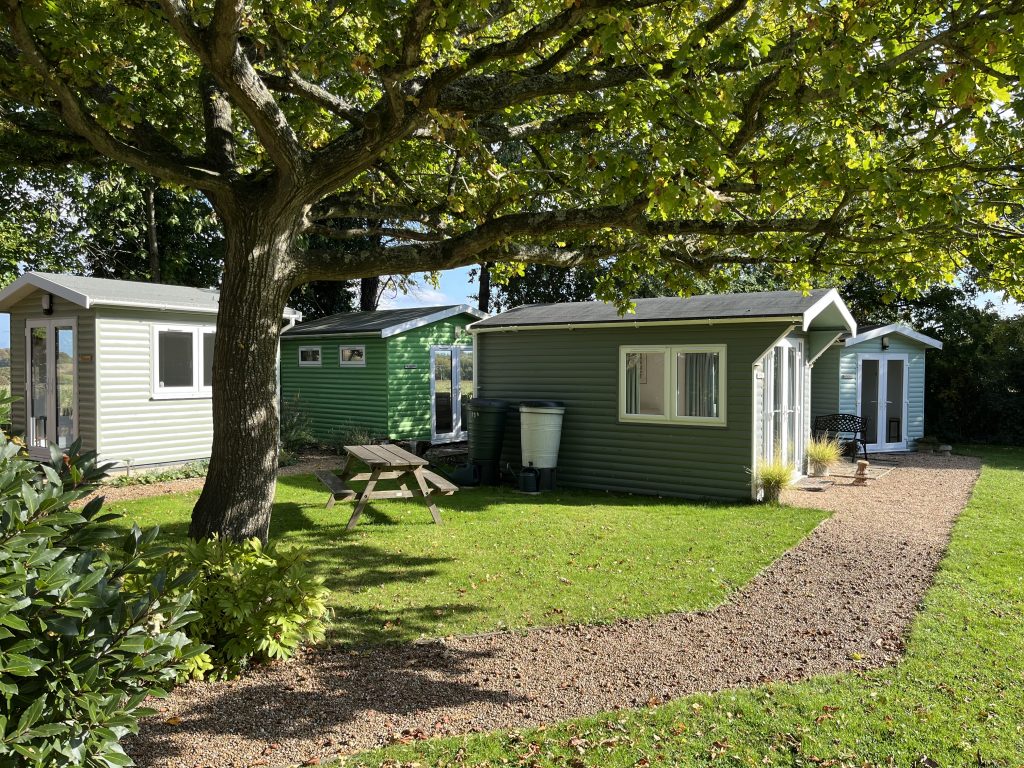 The garden with its four cabins